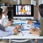 people-using-digital-device-while-meeting